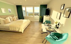 M&D Apartments nähe Stadion mit Klimaanlage - Netflix - Küche - Sunset View - Balkon